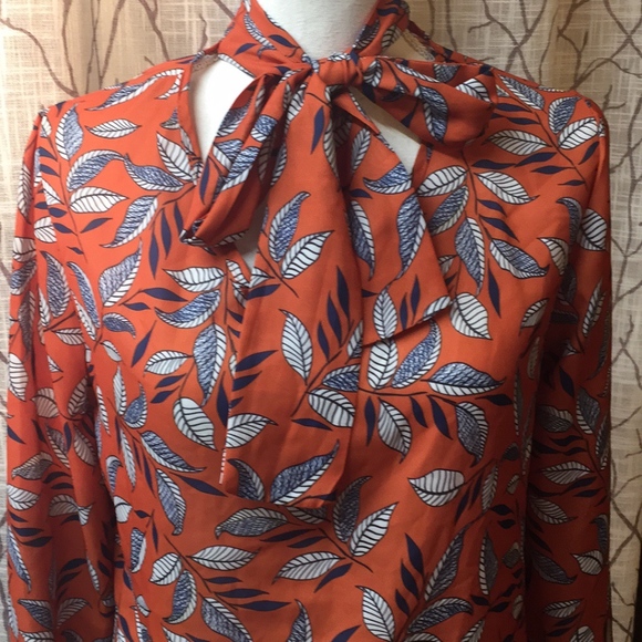 Burnt Orange leaf print tie neck blouse - Picture 2 of 6